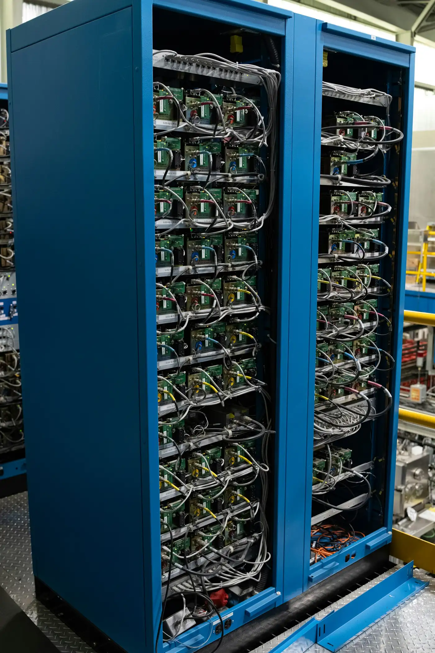 Network cabinets filled with cabled equipment in a data centre